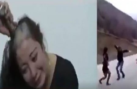 Polis küçədə əxlaqsızlıq edən qızın başını keçəl qırxdı - Video