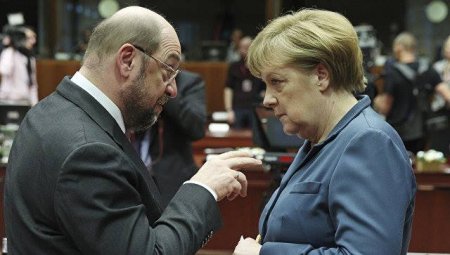 Almaniyada seçki: Merkel Şultsu məğlub etdi