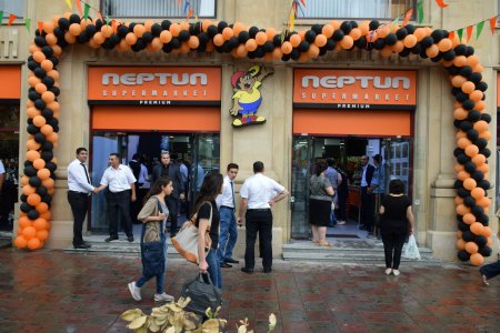 "Neptun" market: rəfdə bir, kassada isə başqa qiymət
